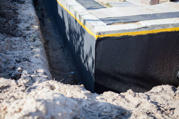 Professional Waterproofing technician working in Jerome, MI